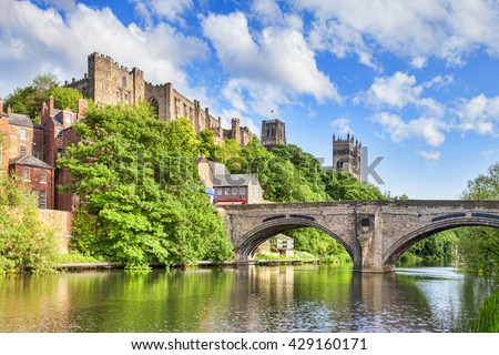 Durham Castle and Cathedral on their rock above the city, and Framwellgate Bridge spanning the River Wear, England, UK Royalty-Free Stock Photo #429160171