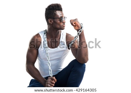 Handsome man with sunglasses and chains