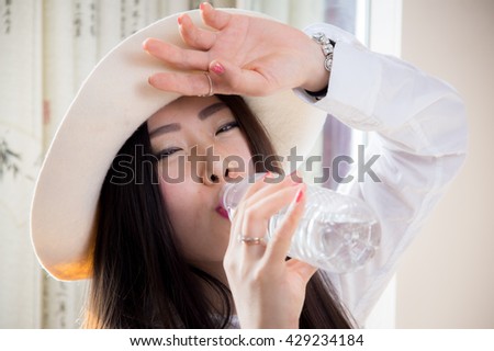 chinese girl with a bottle of water 