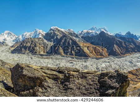 Panorama of the Gokeo region. In this picture three of the highest peaks of the World (left - right) - Everest (8848 m), Lhotse (8516 m), Makalu (8481 m). Gokyo glacier on foreground, Nepal, Himalayas