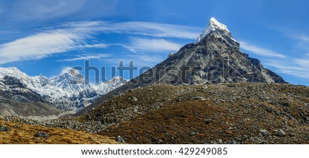Panorama of the Mount Everest, Lhotse, and Chola peaks in the area of Cho Oyu - Gokyo region, Nepal, Himalayas