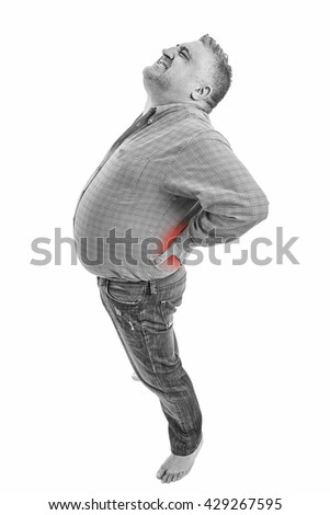 Man with back pain. People, health care and problem concept - unhappy man suffering. White background. Full length picture.