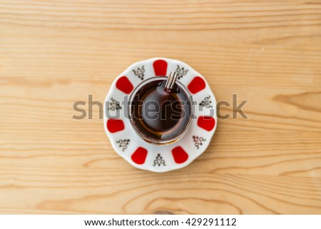 traditional turkish tea on a wooden surface at home in the kitchen balcony daylight top view Royalty-Free Stock Photo #429291112