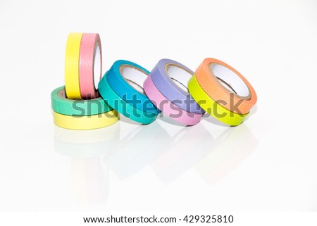 colorful tape rolls background on white