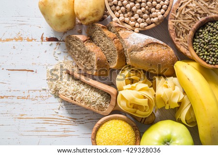 Selection of comptex carbohydrates sources on white background Royalty-Free Stock Photo #429328036