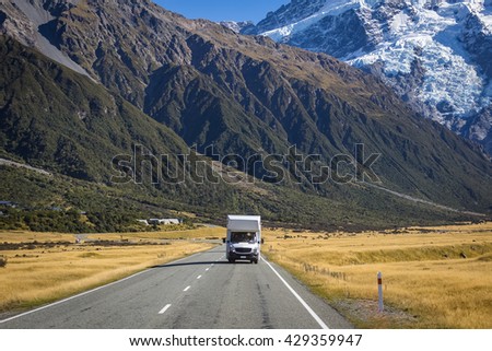 campervan on road with Mount Cook view background, New Zealand