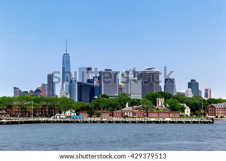 colorful daytime panorama of the New York City Manhattan and Governors Island