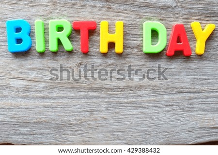 Words of birthday on wooden