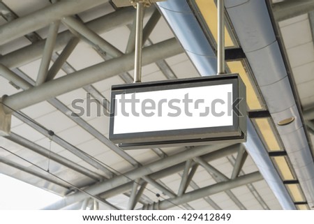 Hanging roullups for advertising ,Empty blank billboard at train station,public commercial,ready for new advertisement,selective focus