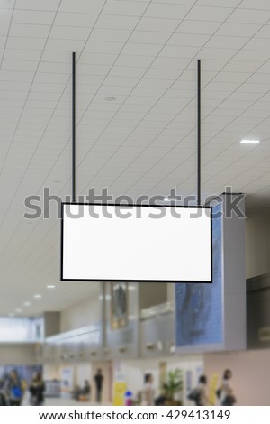 Hanging roullups for advertising ,Empty blank billboard at train station,public commercial,ready for new advertisement,selective focus