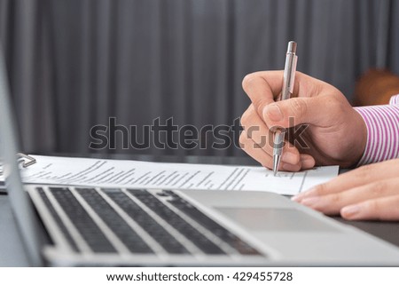 hand using laptop and write note inspire idea
