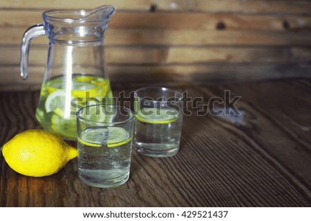 Lemonade in carafe lemon