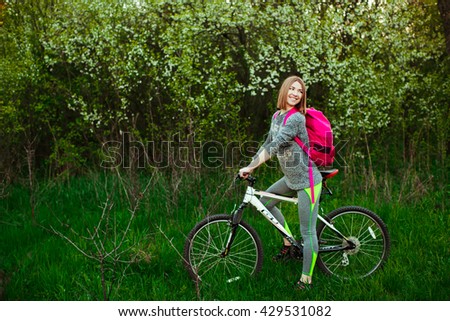 Sports girl on bike