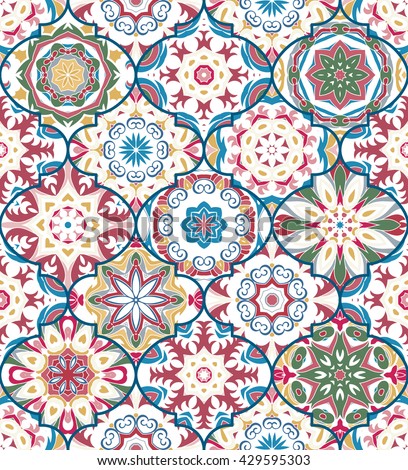 Vector ethnic colorful bohemian pattern in pastel colors with big abstract flowers. Geometric background with Arabic, Indian, Moroccan, Aztec motifs. Ornate print with mandalas within clipping mask