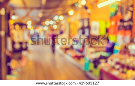abstract blur image of day market for background usage. (vintage tone)