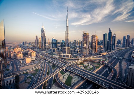 Dubai skyline with beautiful city close to it's busiest highway on traffic Royalty-Free Stock Photo #429620146