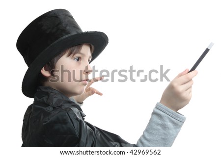 young magician concentrated on the trick he is performing