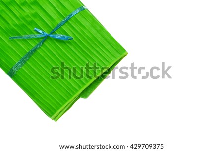 Banana leaves for wrapping or serving food as ecological dishware, isolated on white