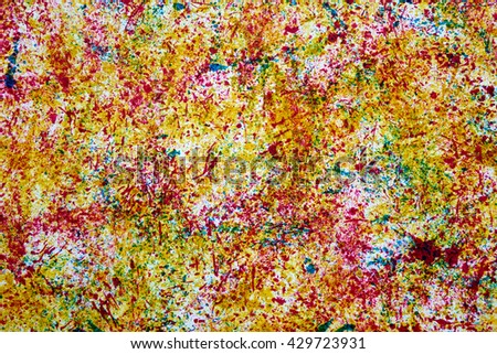   Abstract colorful background created by using paints and brushes                             