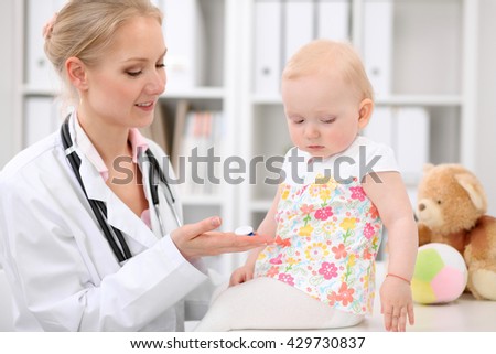 Happy cute baby  after health exam at doctor's office