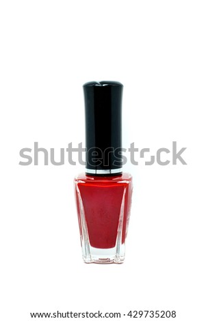 red nail polish bottle on white background
