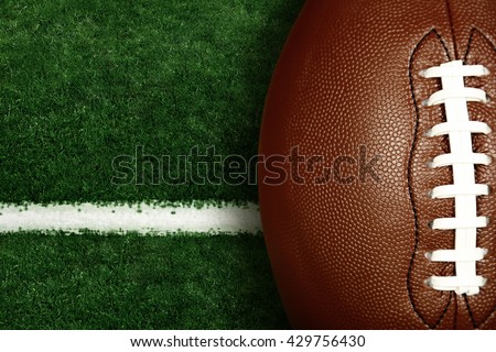 American football on football field background Royalty-Free Stock Photo #429756430