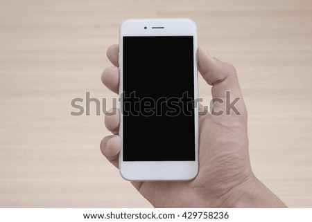 Hand holding a smart phone