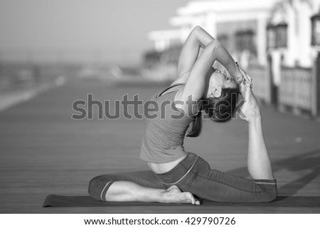 Woman Yoga. Sport. Yoga. Yoga seashore. Beach yoga. Sunrise yoga