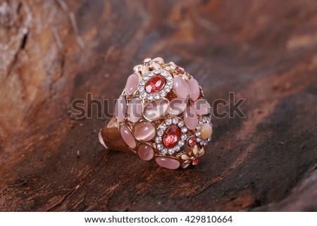 picture of a jewelry on wooden background