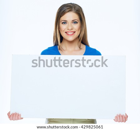 Smiling woman holding advertising board. Big white banner with copy space.