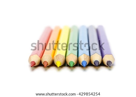 Drawing supplies : Rainbow color pencils. Isolated on white background