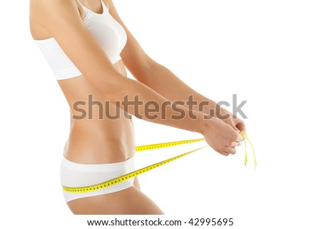 Woman measuring slim body