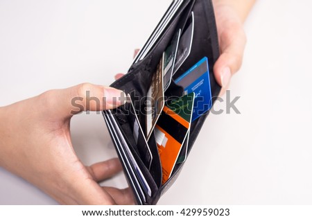 credit card in wallet - cashless Royalty-Free Stock Photo #429959023