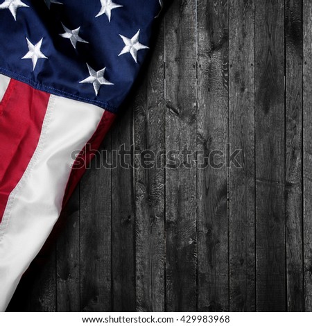 Flag of the USA on wooden background