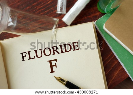 Fluoride written on a page. Chemistry concept.
