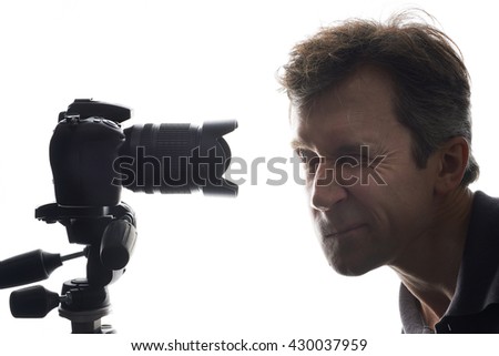 SLR camera shooting portraits isolated on white background