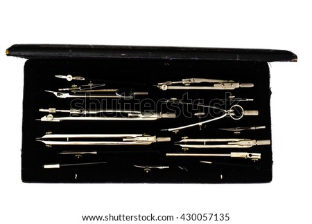 Pair of Compasses and Other Drawing Instruments on White