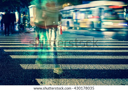 Artistic style - Vintage style,Crosswalk and pedestrian at modern city zebra crossing street in rainy day. Blur abstract.Background concept.