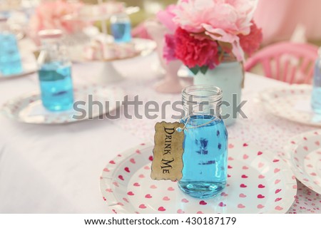 The 'Drink Me' potion, Alice in wonderland tea party theme,toning