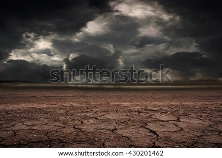 Land to the ground dry cracked with storm. Royalty-Free Stock Photo #430201462