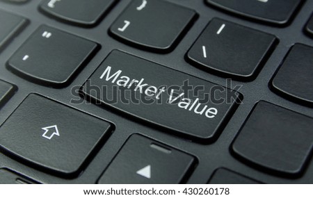 Business Concept: Close-up the Market Value button on the keyboard and have Black color button isolate black keyboard