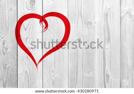 Concept or conceptual painted red abstract heart shape love symbol made by happy child at school, old vintage wood background, metaphor to valentine, romantic, education, romance, happy, art feeling