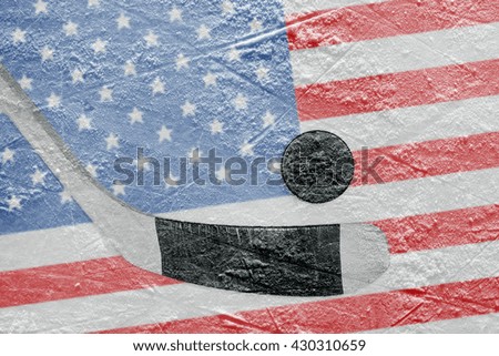 Stick, puck and hockey field with the American flag. The Concept