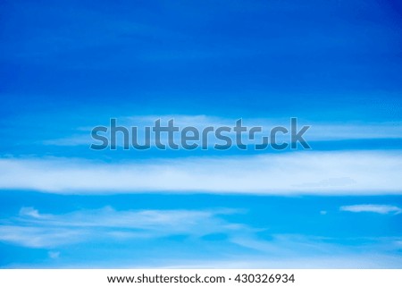Dark Blue sky background with white clouds 