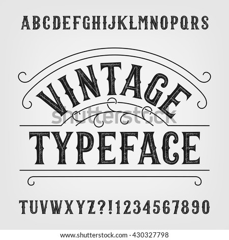 Vintage typeface. Retro distressed alphabet vector font. Hand drawn letters and numbers. Typeset for labels, headlines, posters etc.