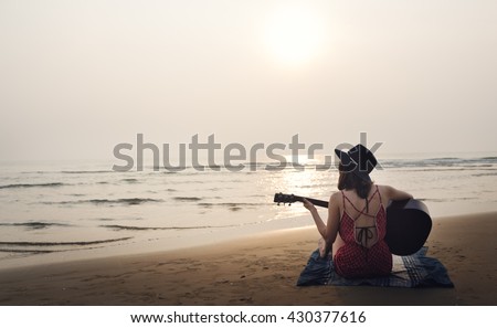 Guitar Playing Girl Beach Relaxation Song Music Concept