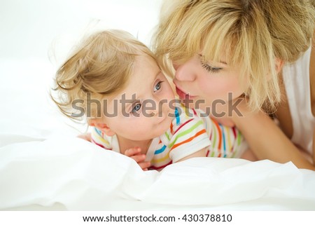 happy family. Mother and baby playing and smiling 