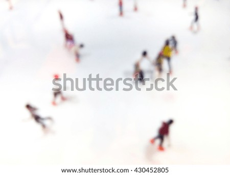 Blur image of ice skate in the mall use for background.