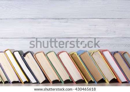 Stack of colorful books. Education background. Back to school. Copy space for text