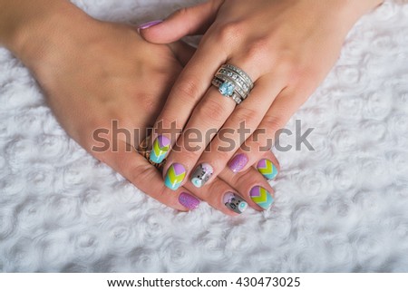 Summer nail art with chevron design with teddy bear picture